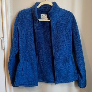 Zip up blue jacket